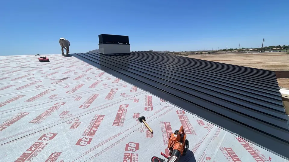New metal roof panels installed by Pinnacle Roofing