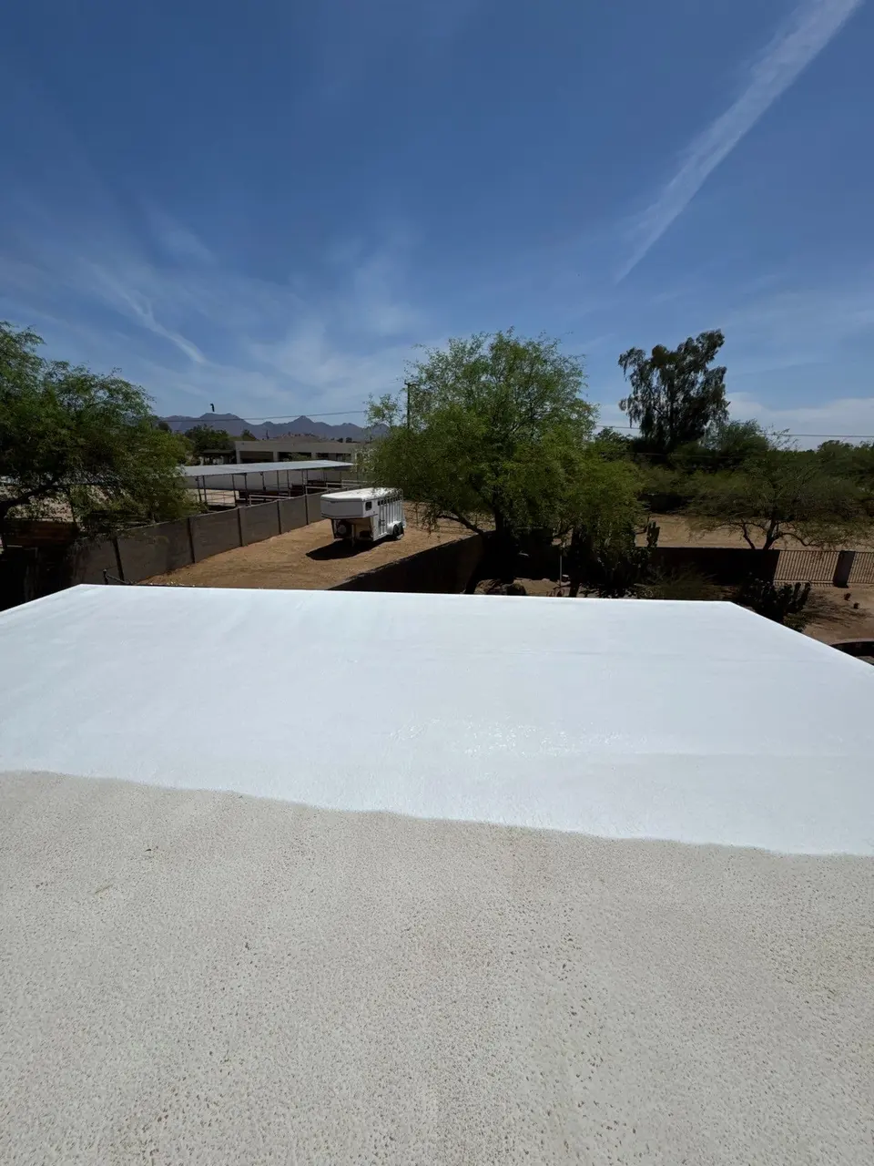 Foam roof recoating in progress