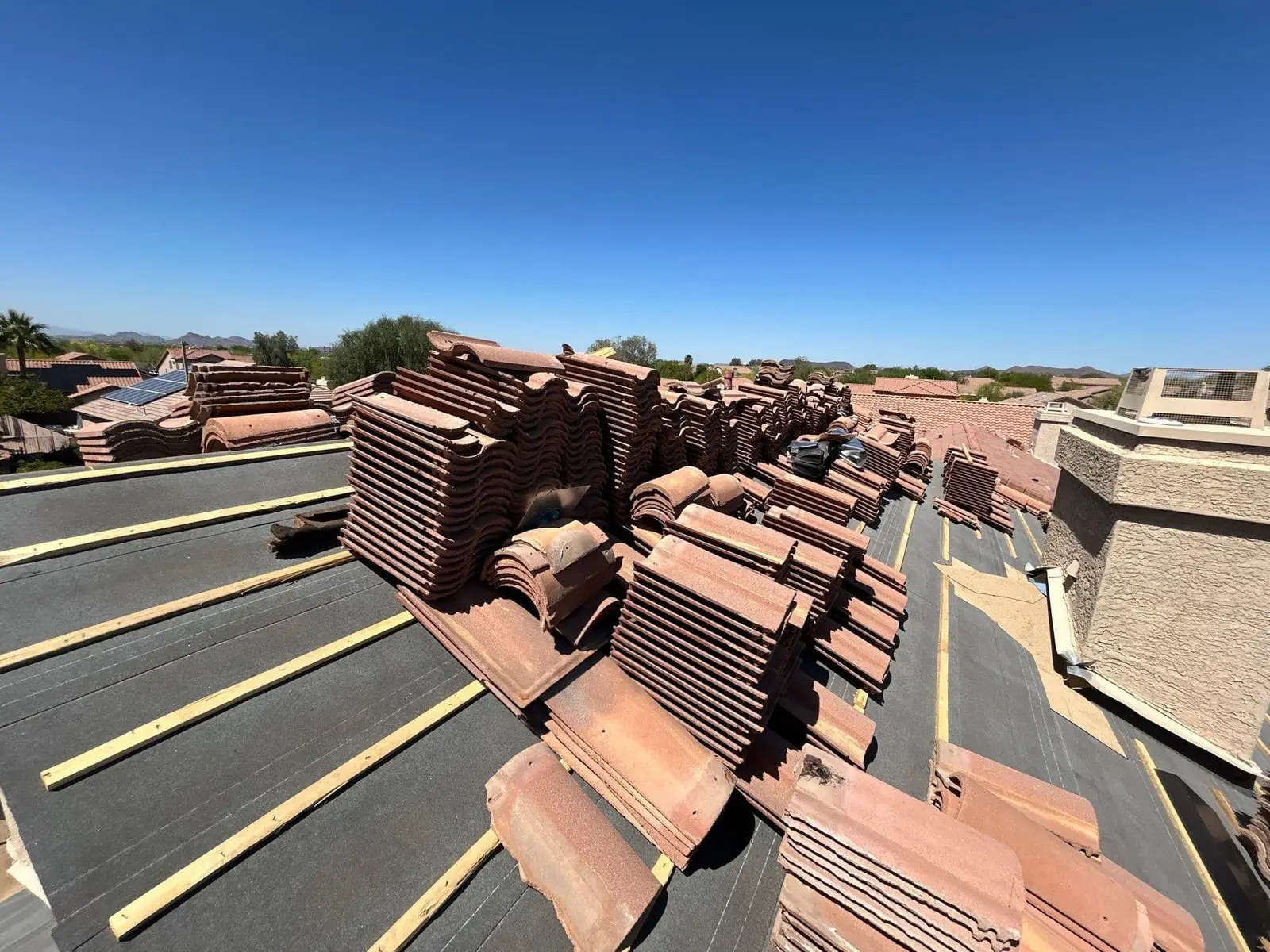 Roof replacement in progress on a Phoenix-area home